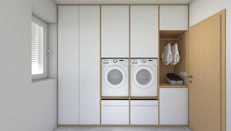 Modern bathroom cabinetry with integrated laundry area for efficient space use.