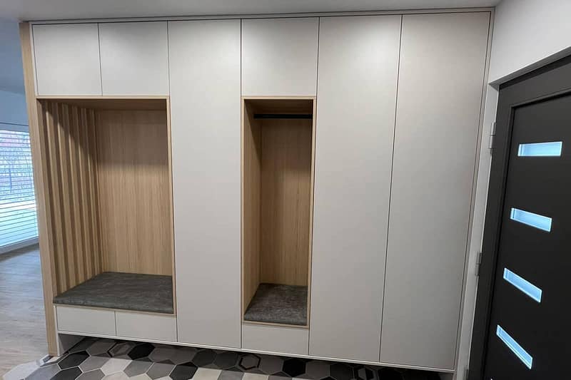 Custom hallway wardrobe with open niches and storage drawers for PREDSOBE.