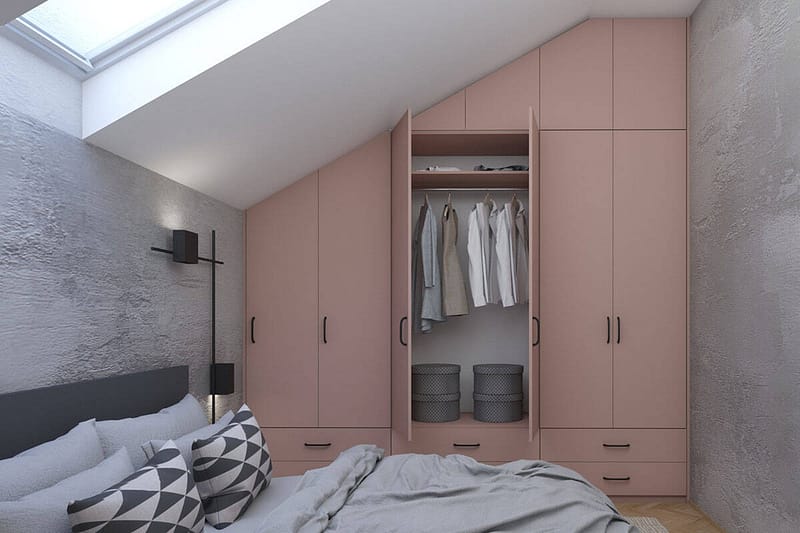 Custom bedroom wardrobe with pink finish and ample storage space.